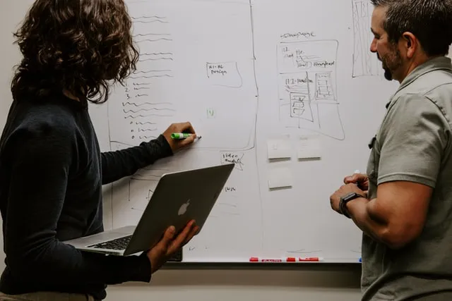 Two colleagues working on infrastructure