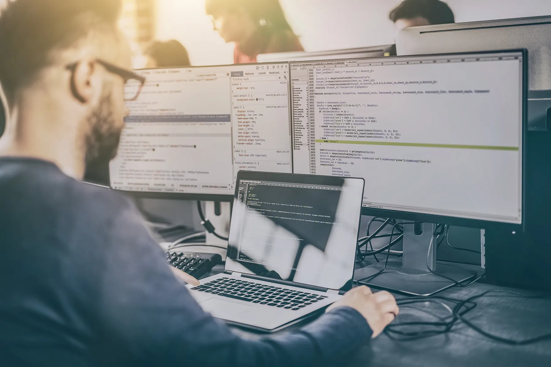 A developer working on a laptop