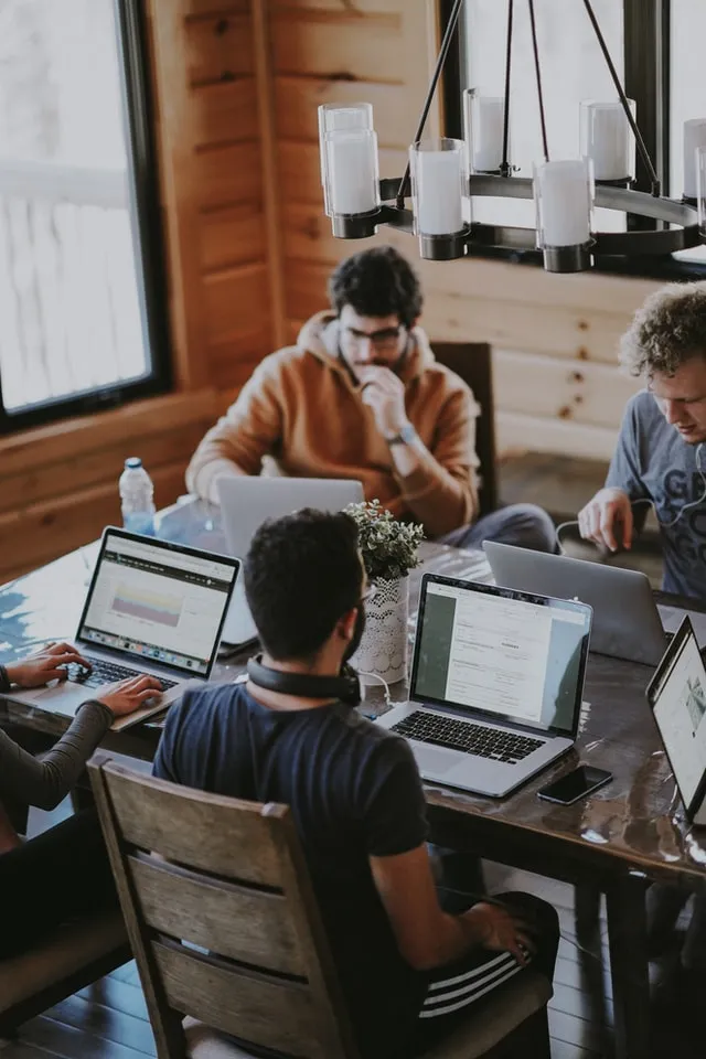A team working at their desks